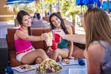 girls toasting at Al Fresco restaurant