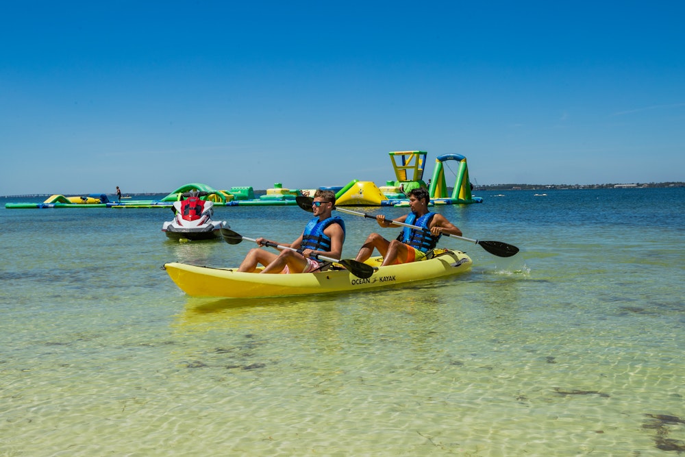 guys kayaking on Adventure Cove, Portofino Island Resort